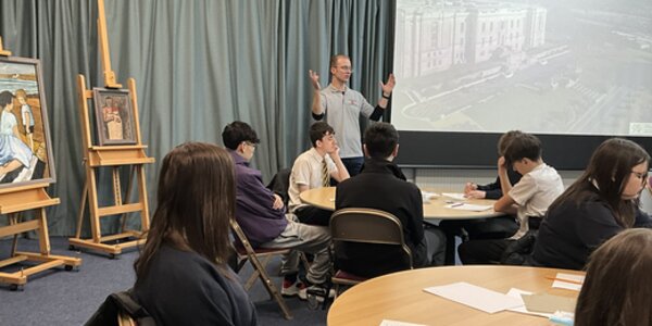Pupils listening to an art discussion